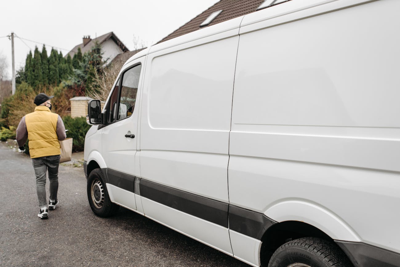 Courier with a delivery van